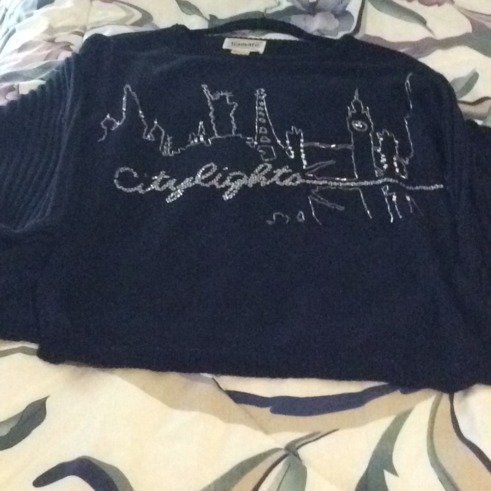 Women sweater black color with silver beads